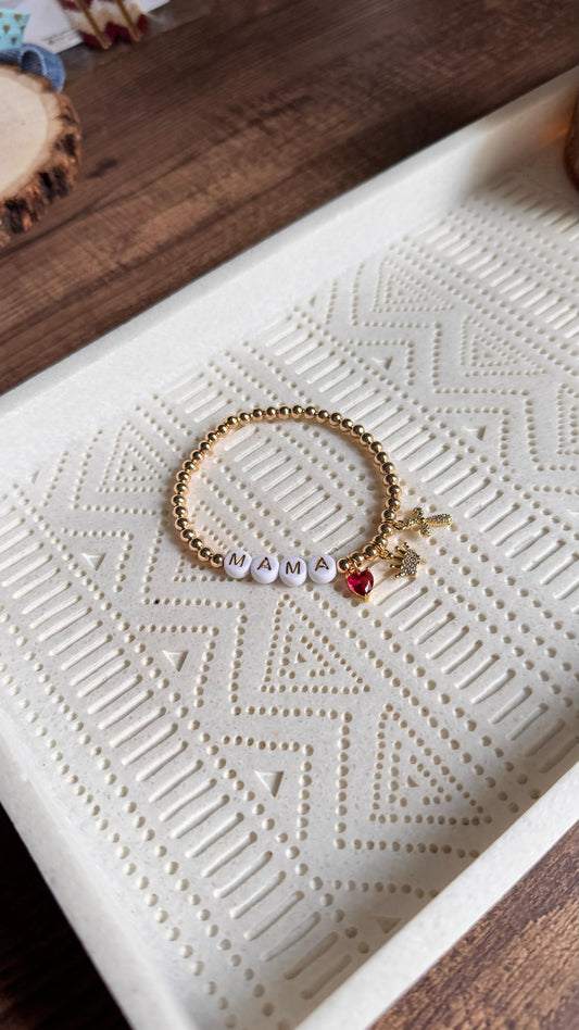 Pulsera elástica MAMÁ dorada con dijes